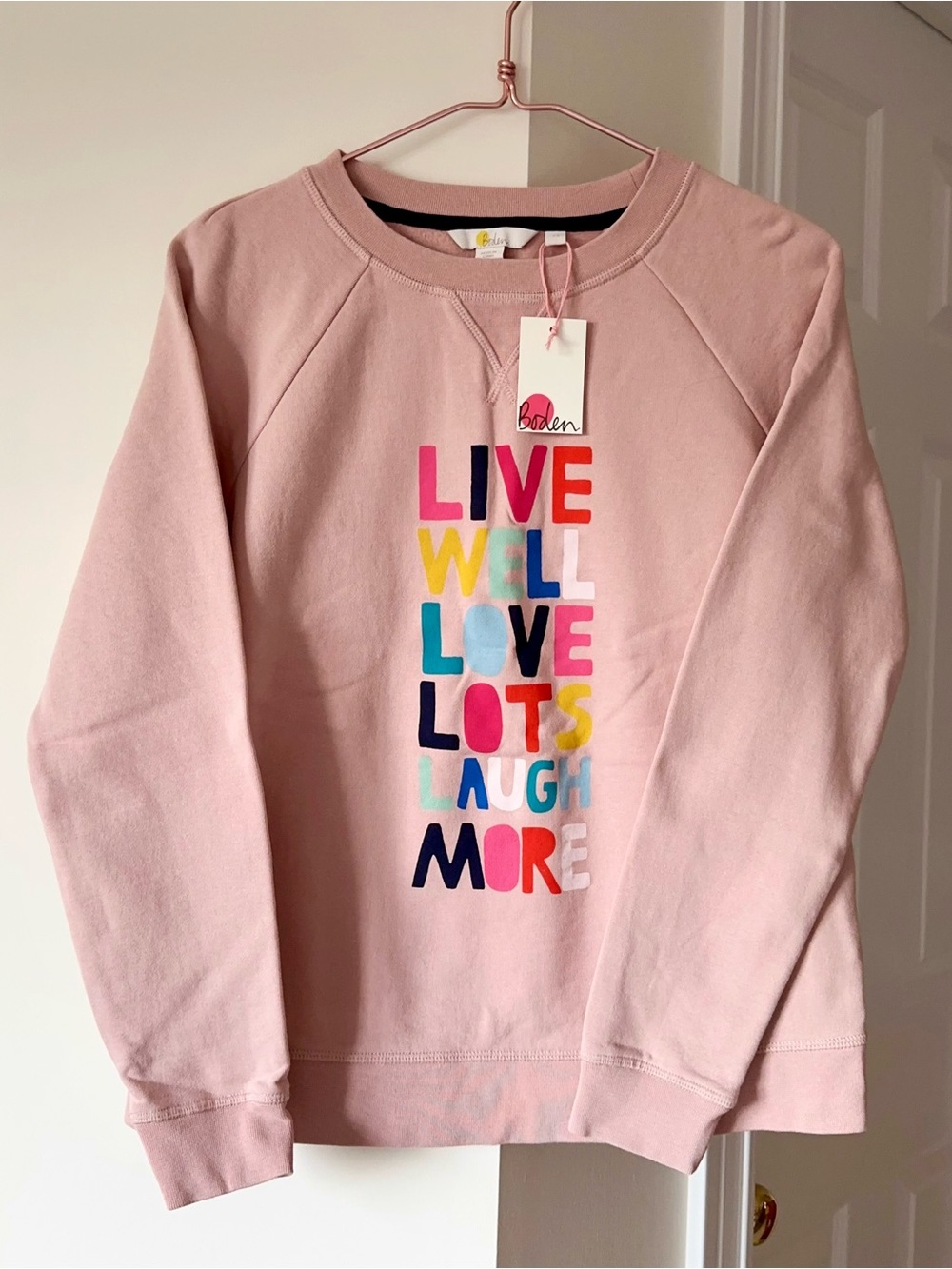 Boden Pink Sweatshirt with Colorful Vertical Text Graphic